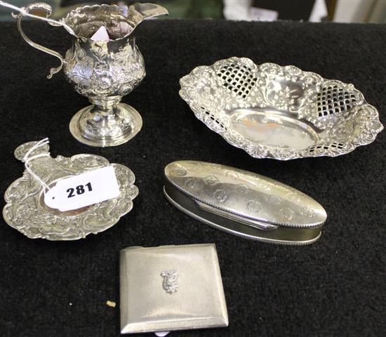 Silver helmet-shaped cream jug, pierced dish, tea strainer, engraved oval box & engine-turned compact